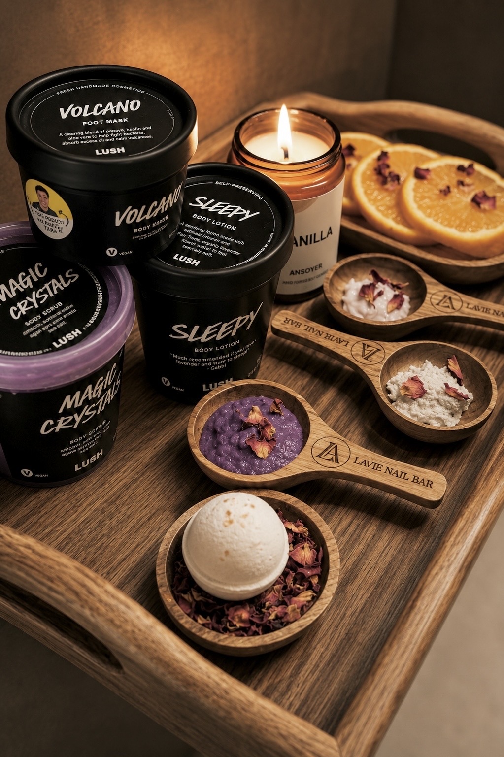 Lush spa pedicure tray with Volcano foot mask, Magic Crystals scrub, Sleepy lotion, and rose-petal bath bomb